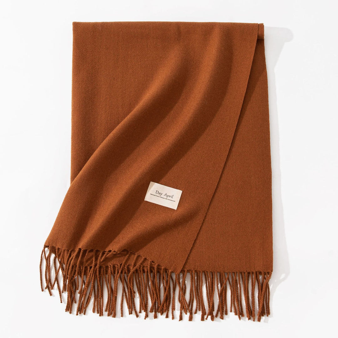 Woman wearing wide soft shawl scarf