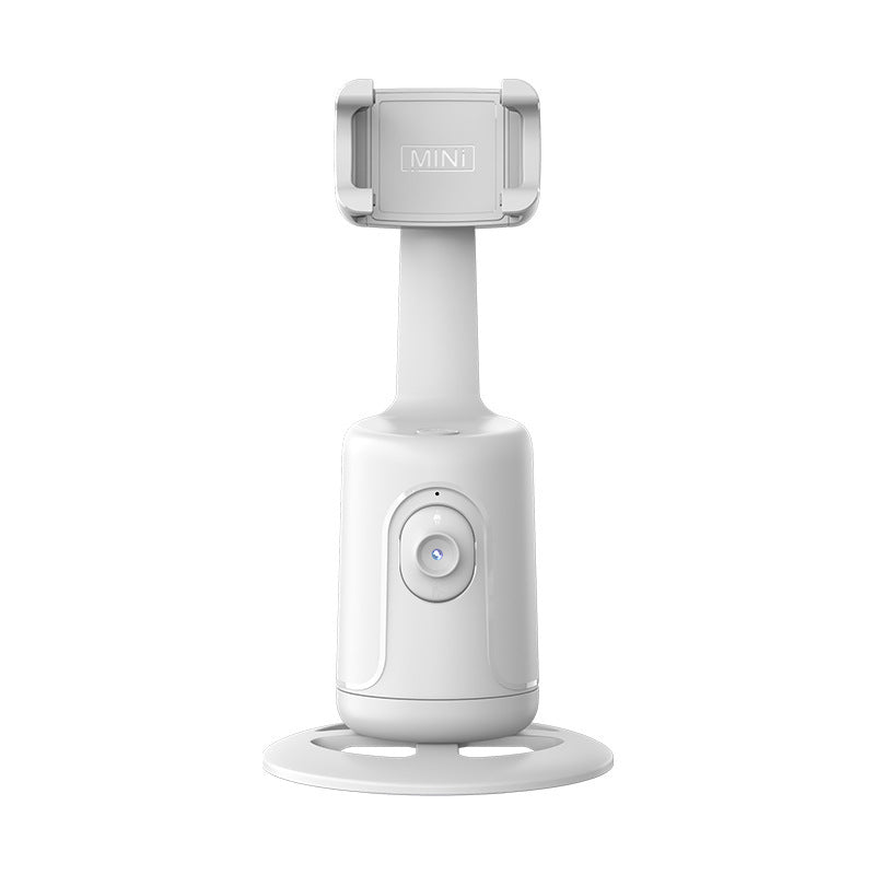 Face-tracking phone holder rotating with phone