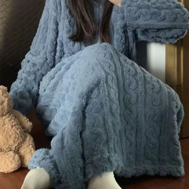 Woman in long pink coral fleece nightgown