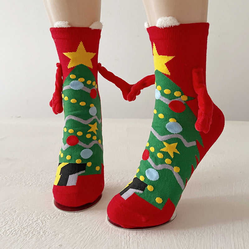 Christmas socks with magnetic hands linked