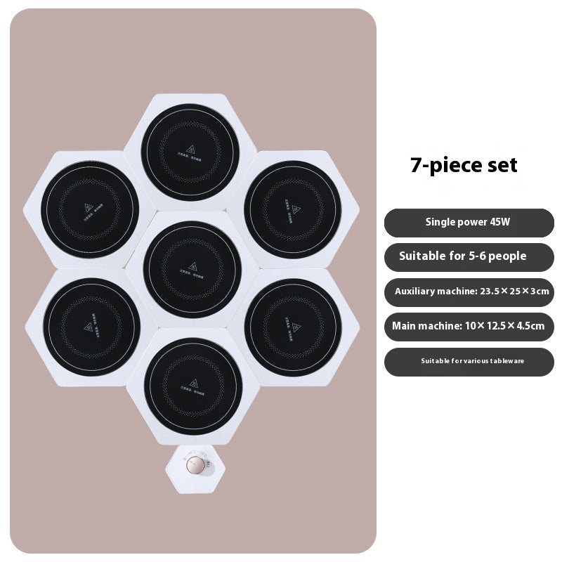 White hexagonal warming plates with dishes on top