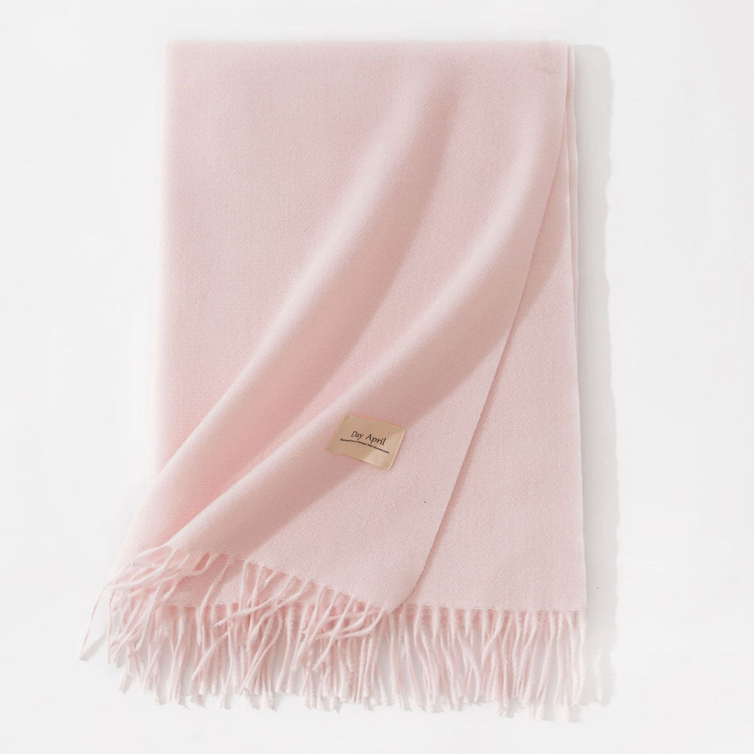Woman wearing wide soft shawl scarf