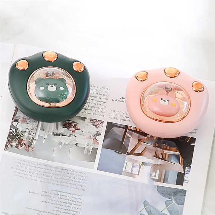 Cat-paw rechargeable hand warmer in hand