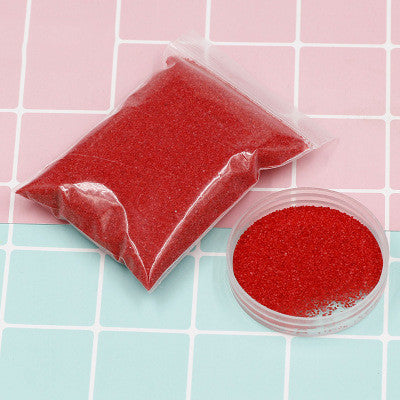 Coloured magic sand shaped underwater