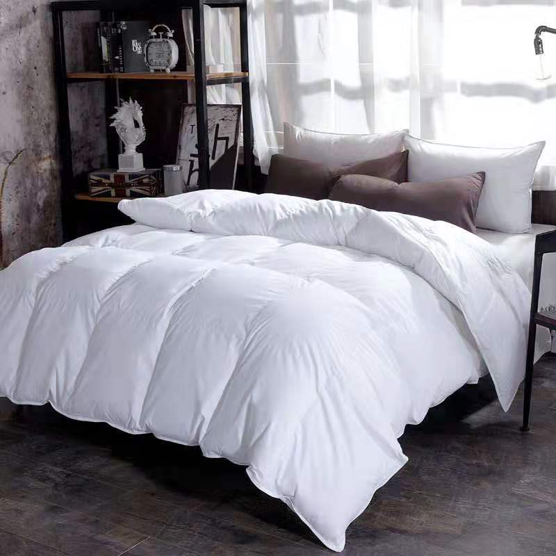 Quilted winter duvet on a bed