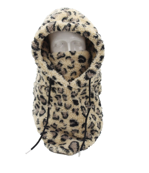 Woman wearing beige plush hood with scarf