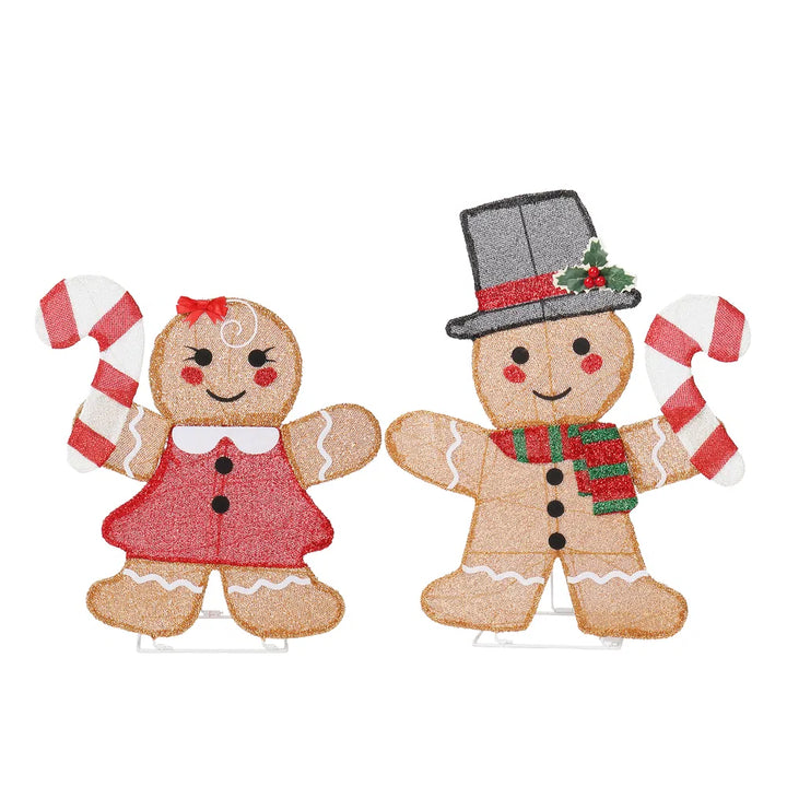 Two light-up gingerbread figures with candy canes