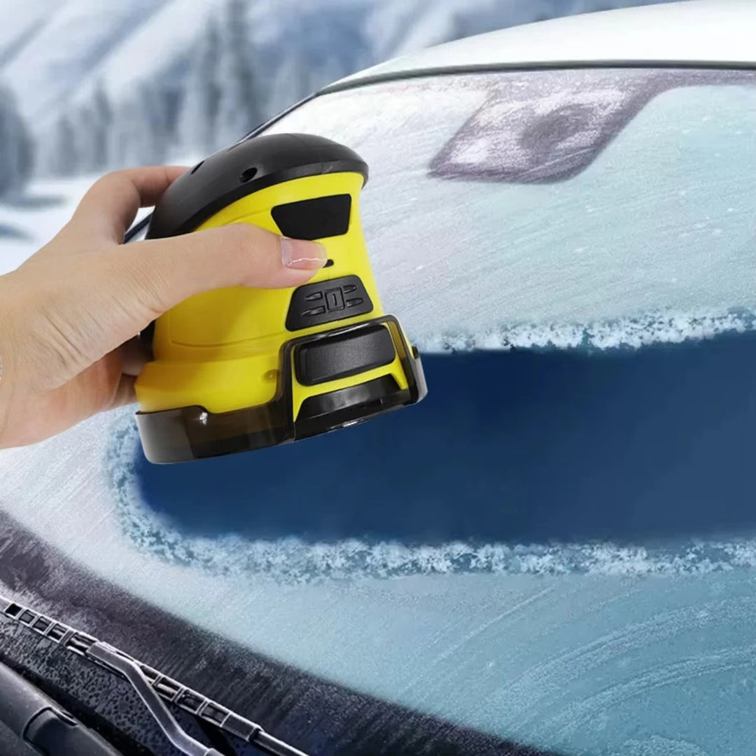 Electric ice scraper on frosty windscreen