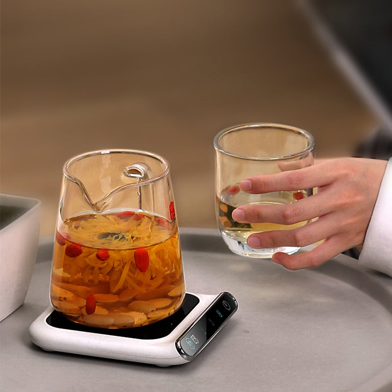 White glass cup warmer coaster with mug