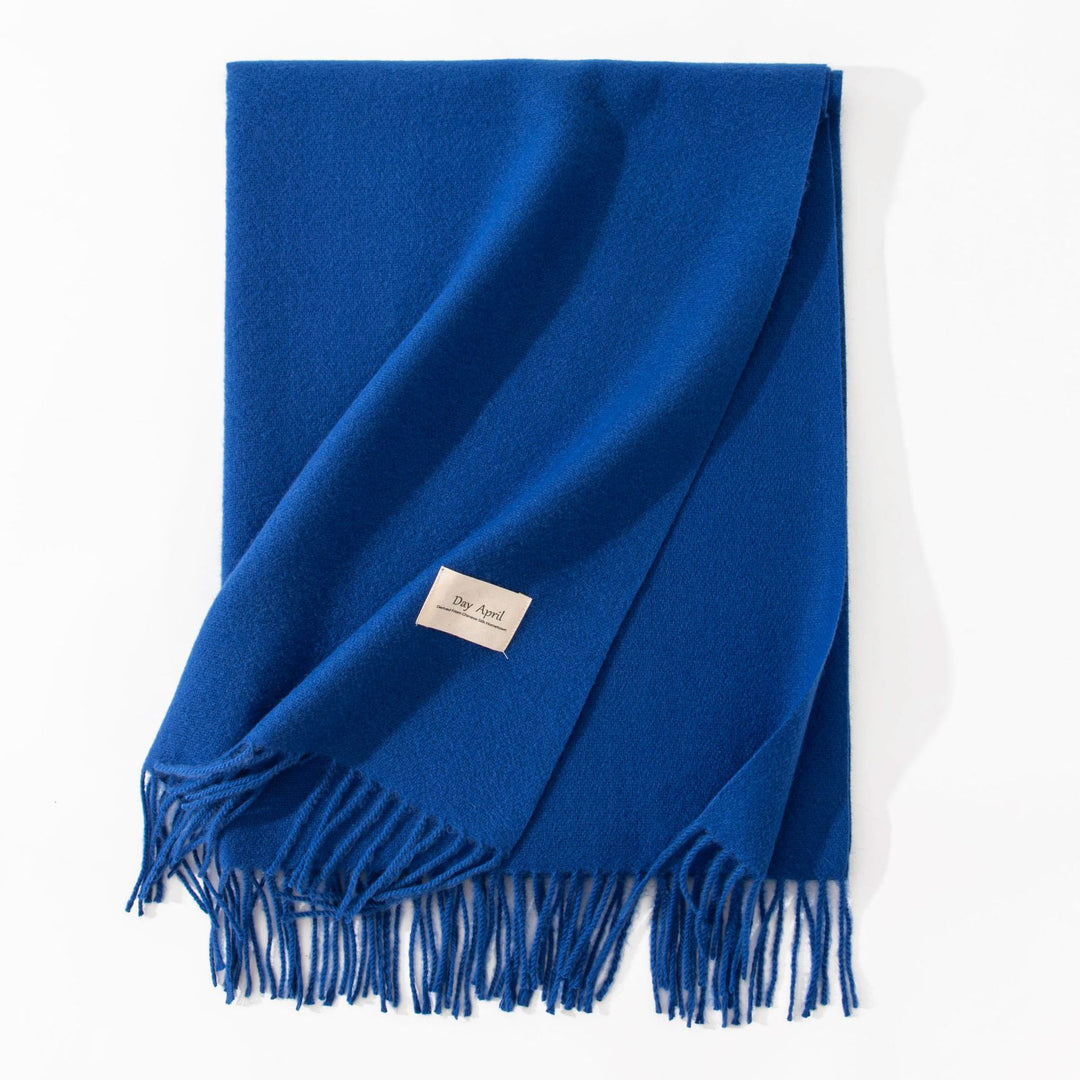Woman wearing wide soft shawl scarf