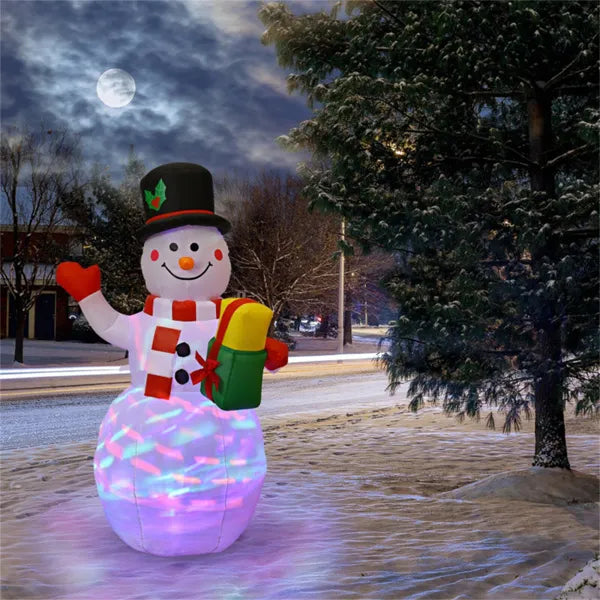 Inflatable snowman holding a gift box