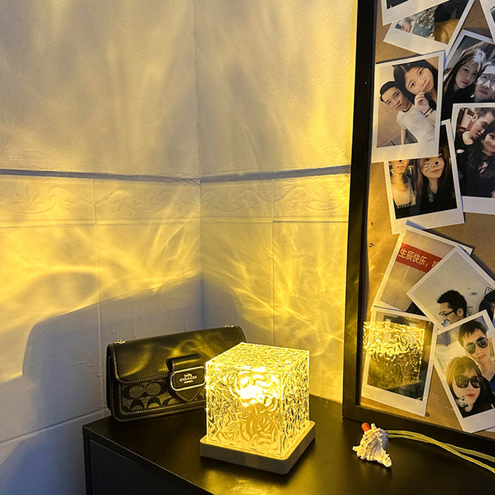 Water ripple night light on a wooden base