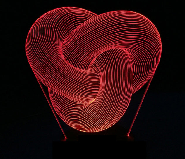 Glowing twisted knot illusion lamp