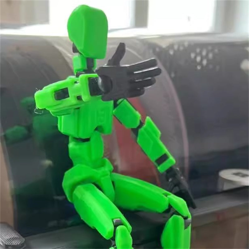 Poseable 3D printed robot figure on desk
