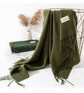 Woman wearing wide soft shawl scarf