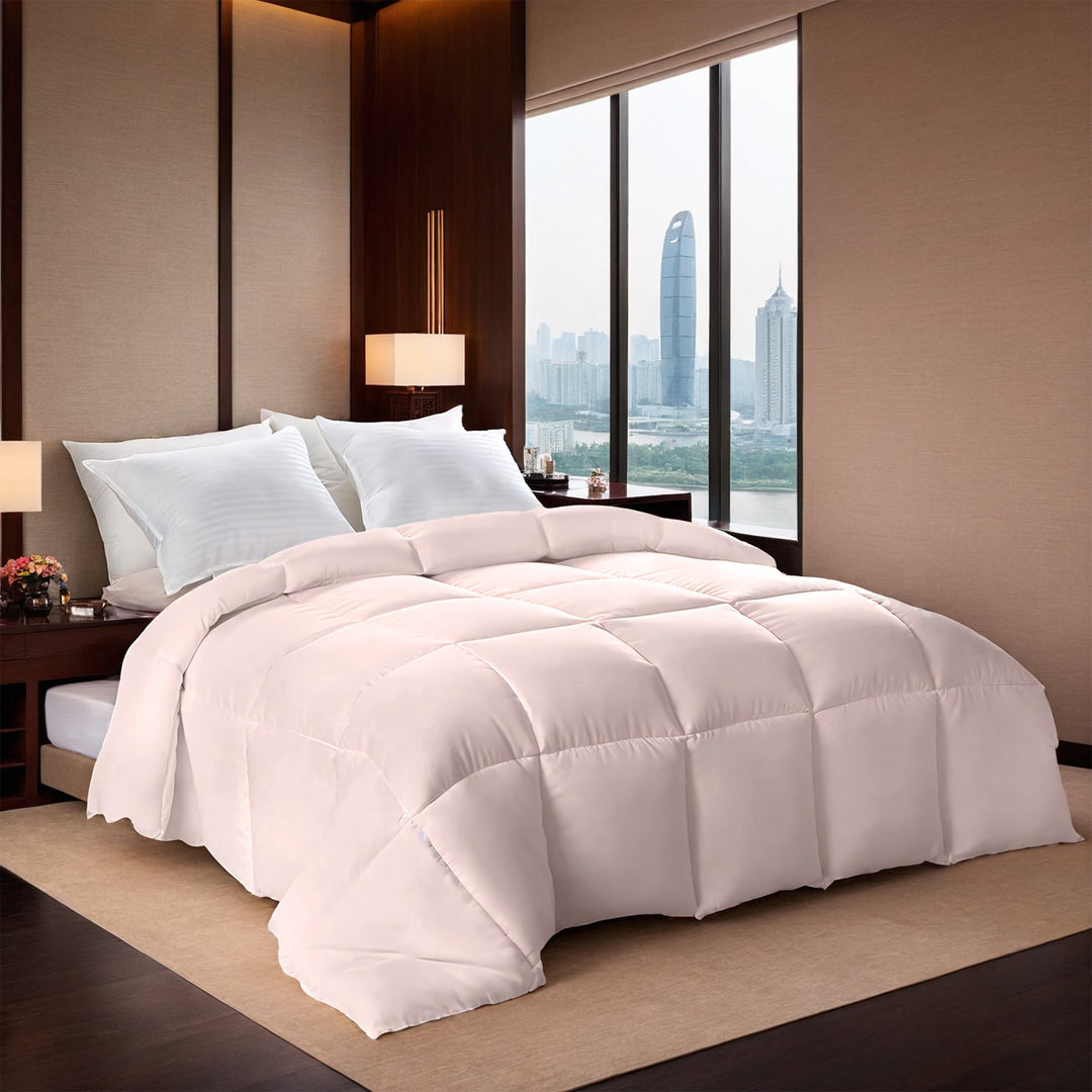 Pink box-stitched duvet on bed