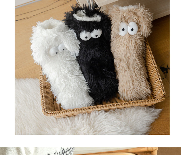 Fluffy snow socks with cartoon eyes