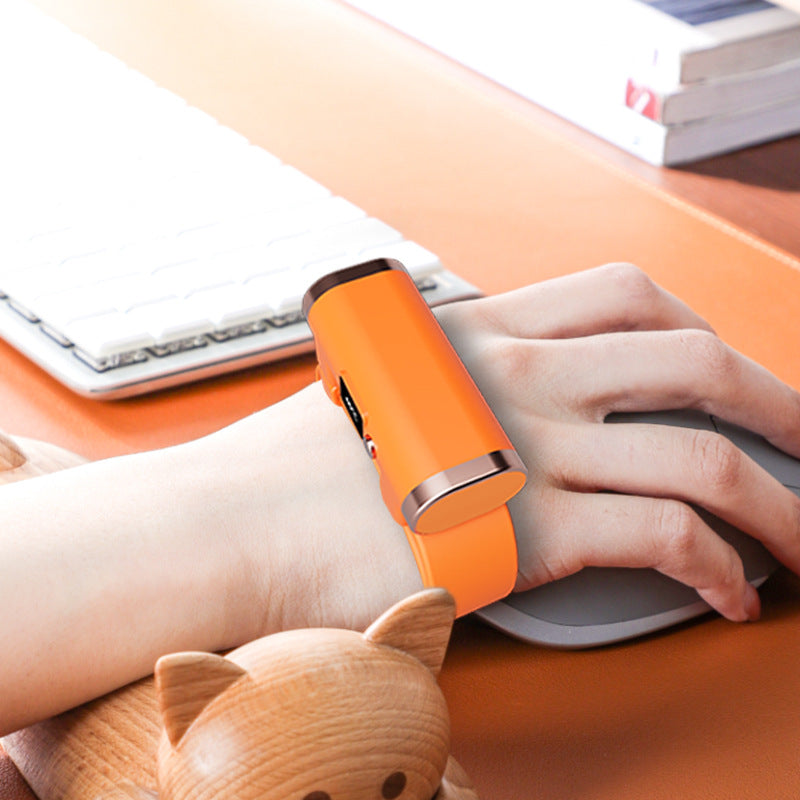 Pink bracelet hand warmer on wrist