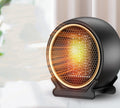 Compact round black ceramic fan heater