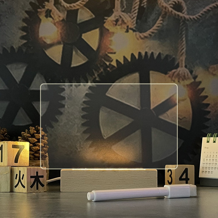 Glowing acrylic message board on wooden base