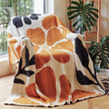 Snugleigh™ Boho Floral Leaf Knitted Throw in Anti-Pilling Microfibre