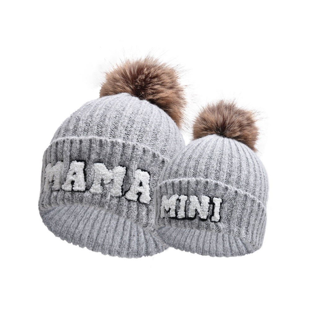Pink MAMA and MINI beanies with pompoms