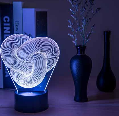 Glowing twisted knot illusion lamp