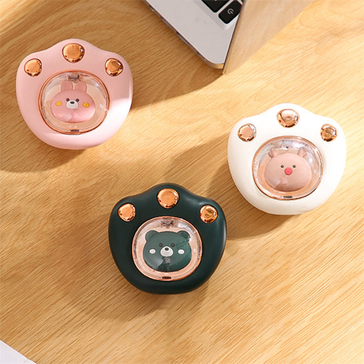 Cat-paw rechargeable hand warmer in hand