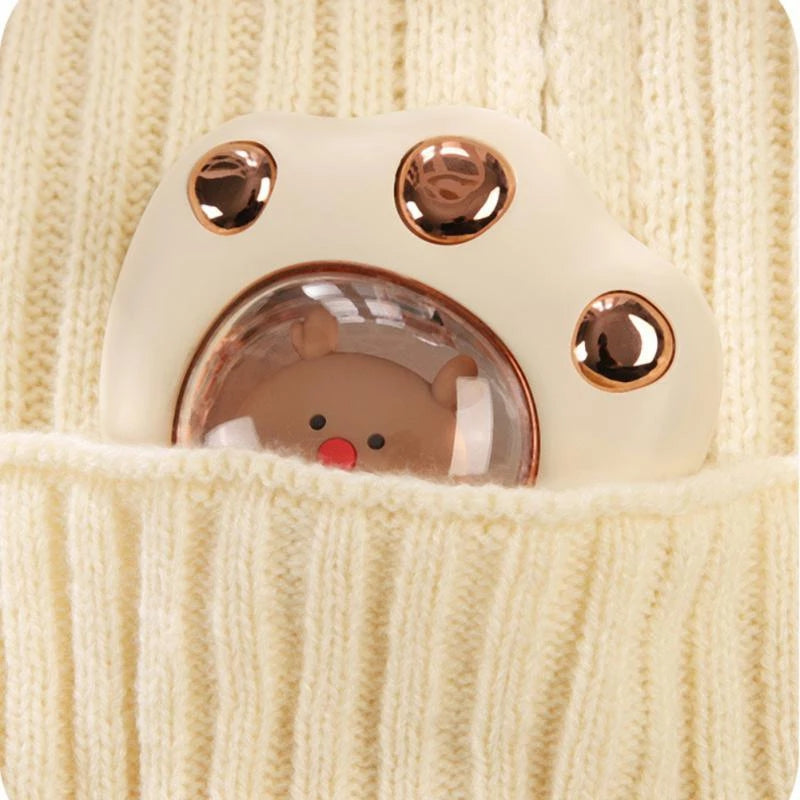 Cat-paw rechargeable hand warmer in hand