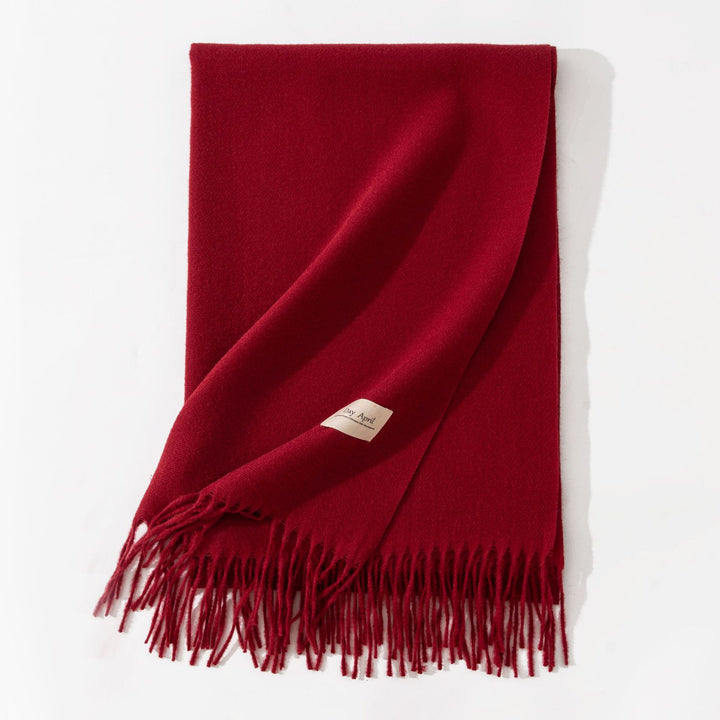 Woman wearing wide soft shawl scarf