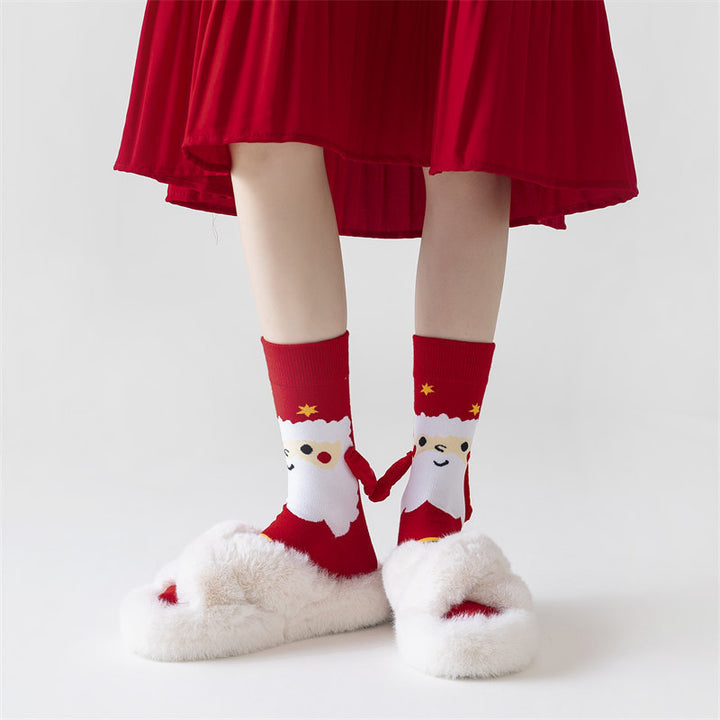 Christmas socks with magnetic hands linked