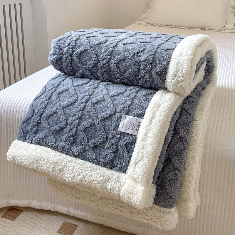 Cream cable knit blanket with sherpa border