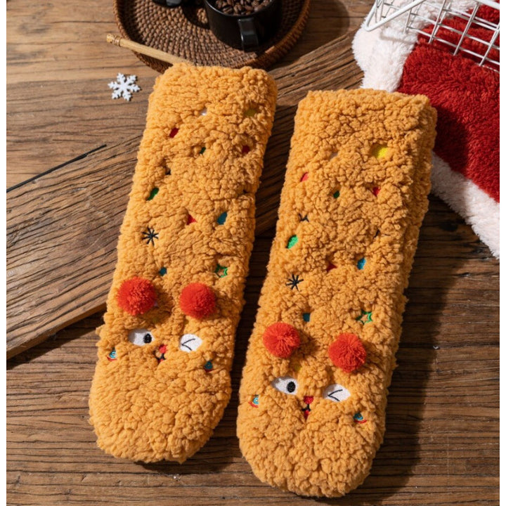 Fluffy yellow socks with embroidered face and pompoms