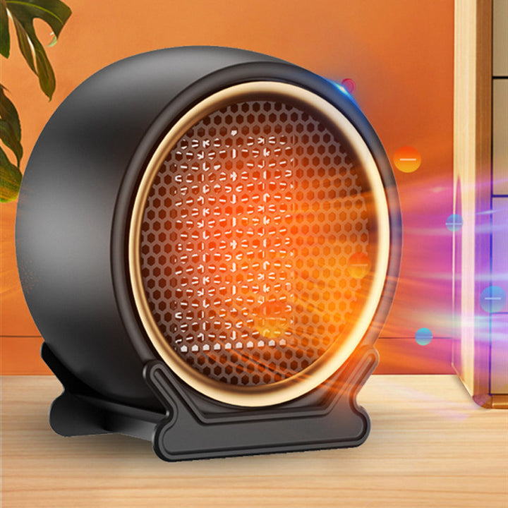Compact round black ceramic fan heater
