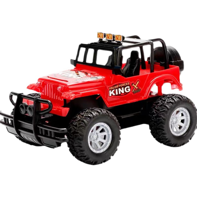 Red remote control jeep on grass