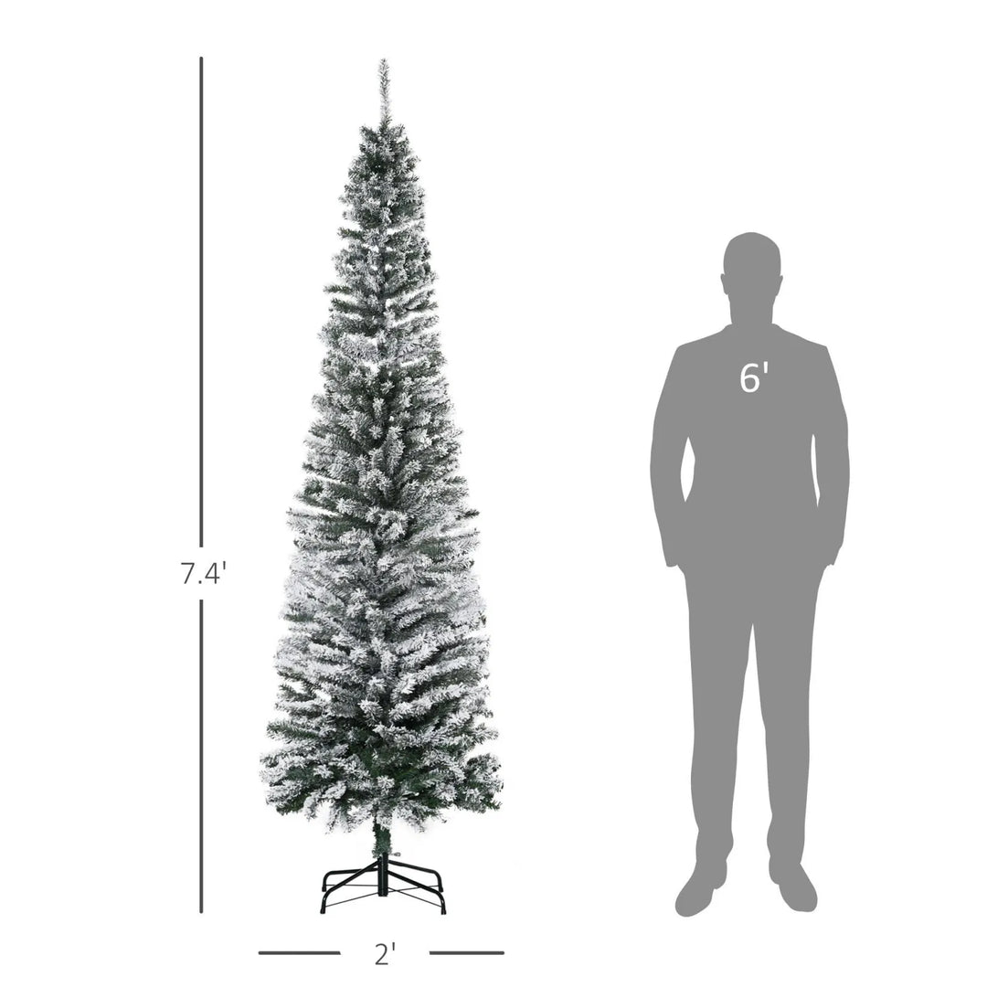 Tall slim snow-flocked tree, unlit