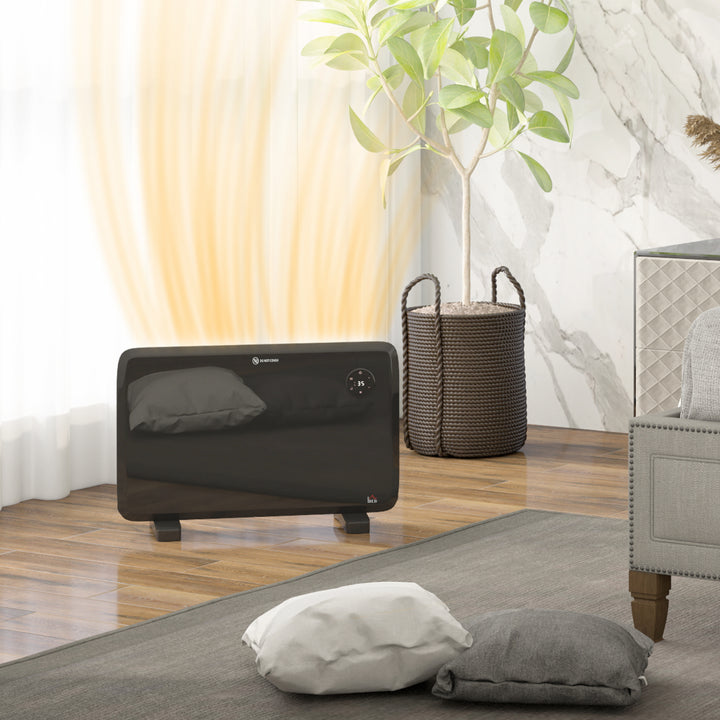 slim black electric panel heater on feet