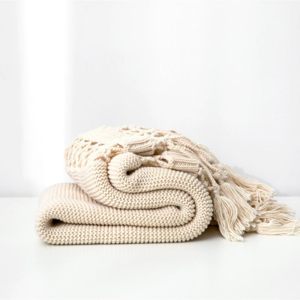 Snug Knit Woven Tassel Blanket