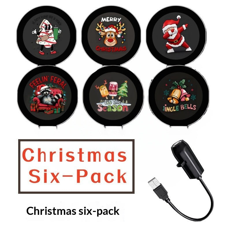 USB projector casting Christmas pattern on wall