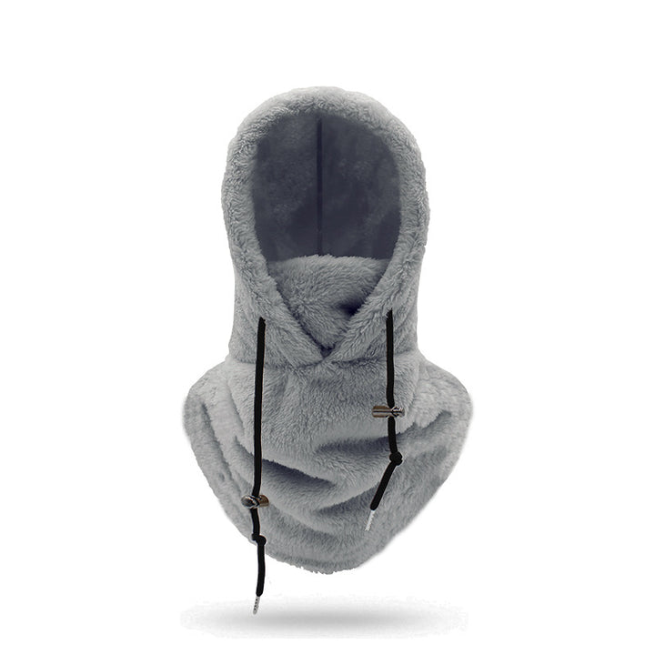 Woman wearing beige plush hood with scarf