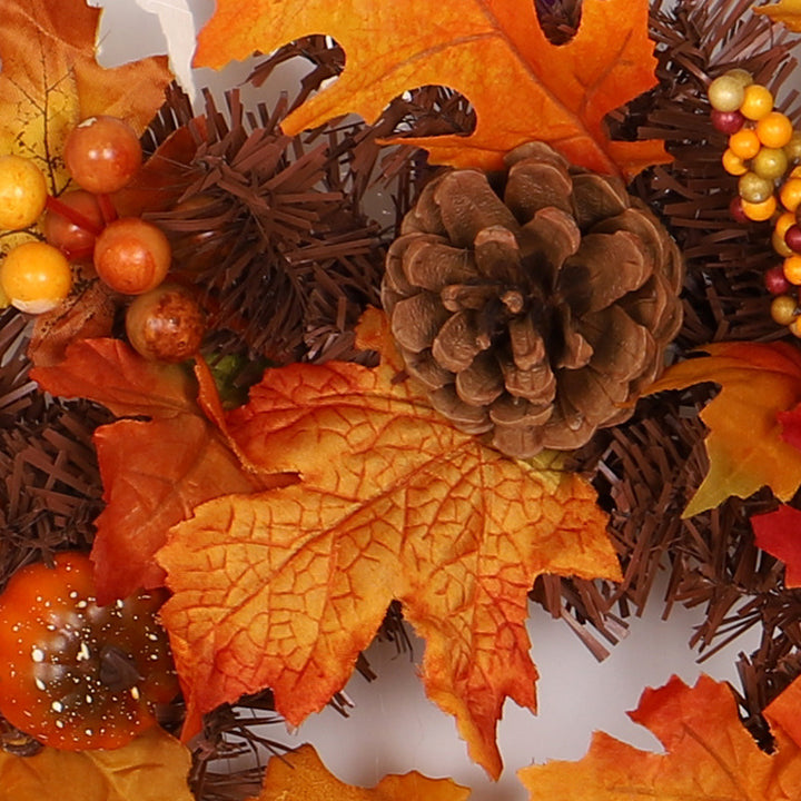 Autumn maple leaf garland on a mantel