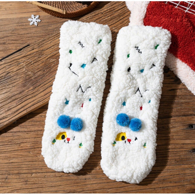 Fluffy yellow socks with embroidered face and pompoms