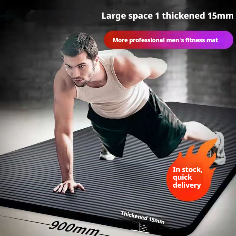 Thick grey exercise mat rolled with carry strap
