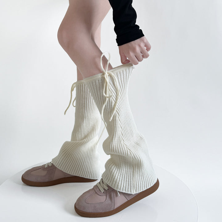 Pink flared ribbed leg warmers with tie