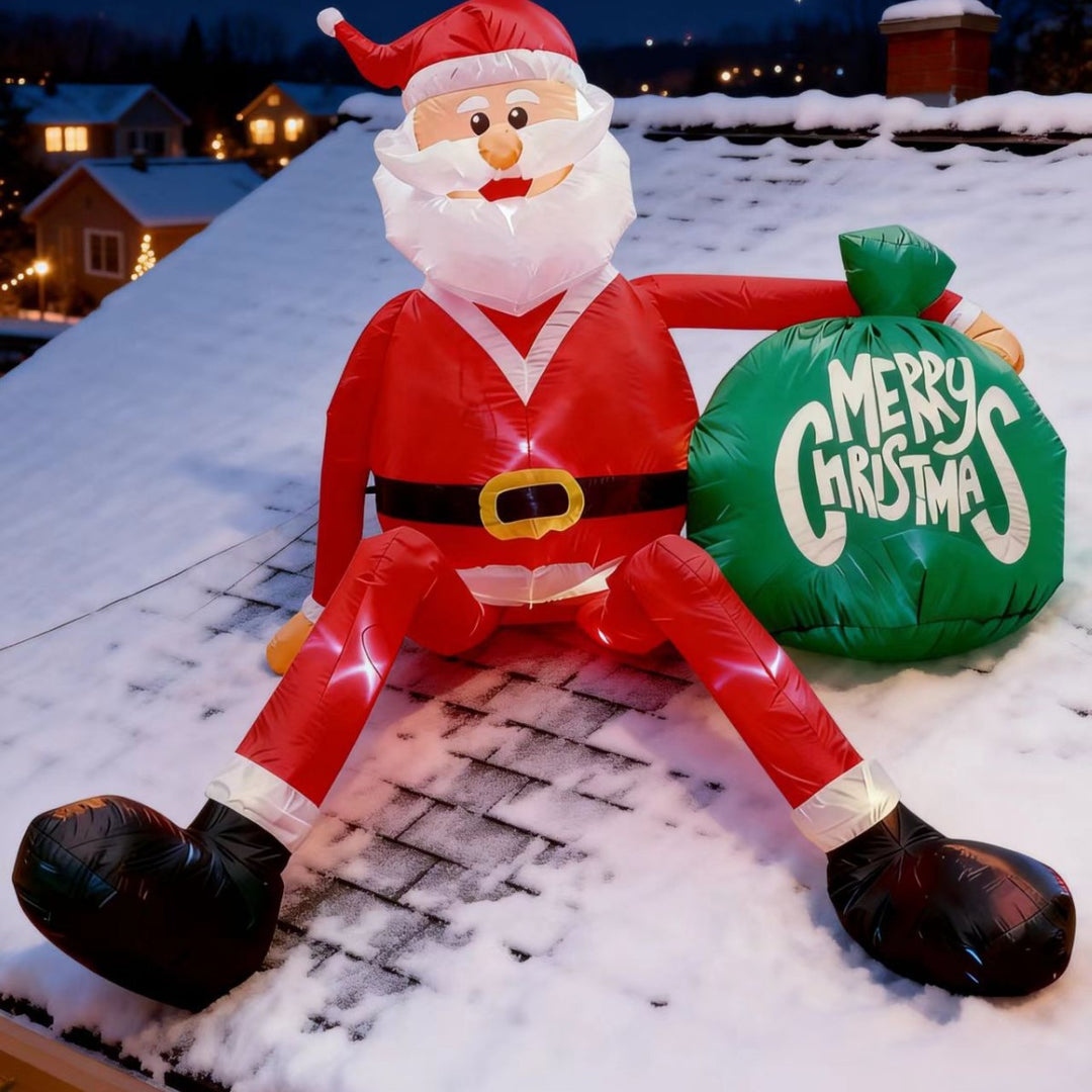 Giant inflatable Santa with gift sack in garden