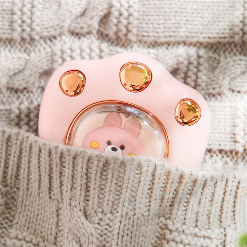 Cat-paw rechargeable hand warmer in hand