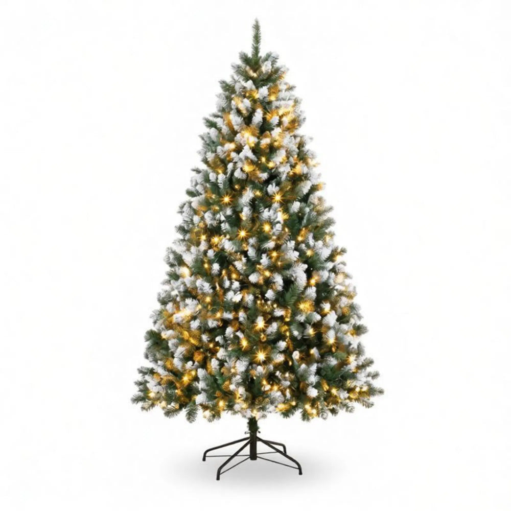 Tall snow-tipped pre-lit tree with remote
