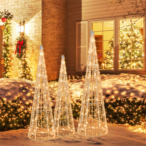 Three lit cone trees with star beads