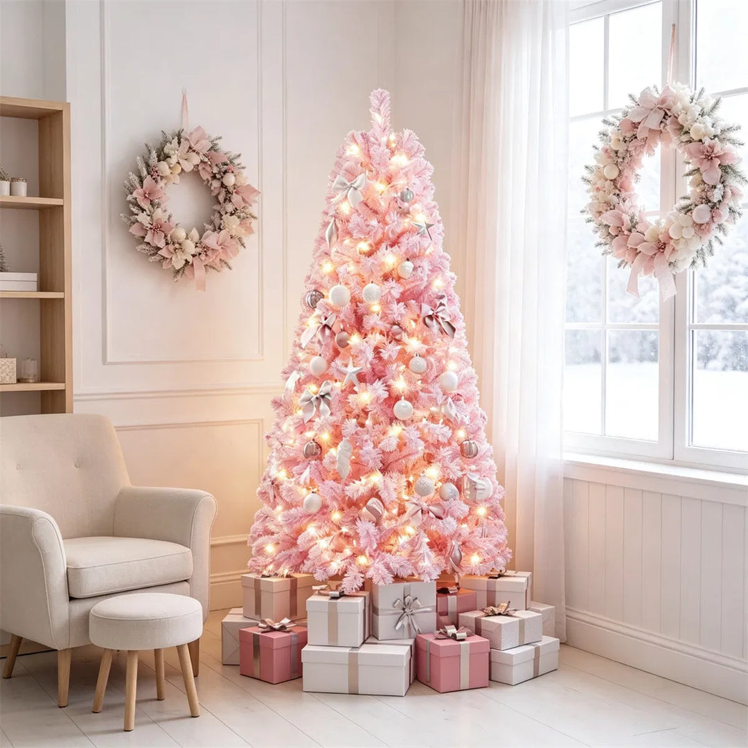Small pink flocked tree with warm lights