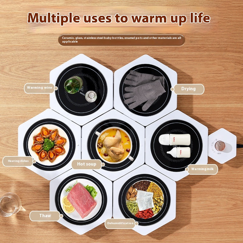White hexagonal warming plates with dishes on top